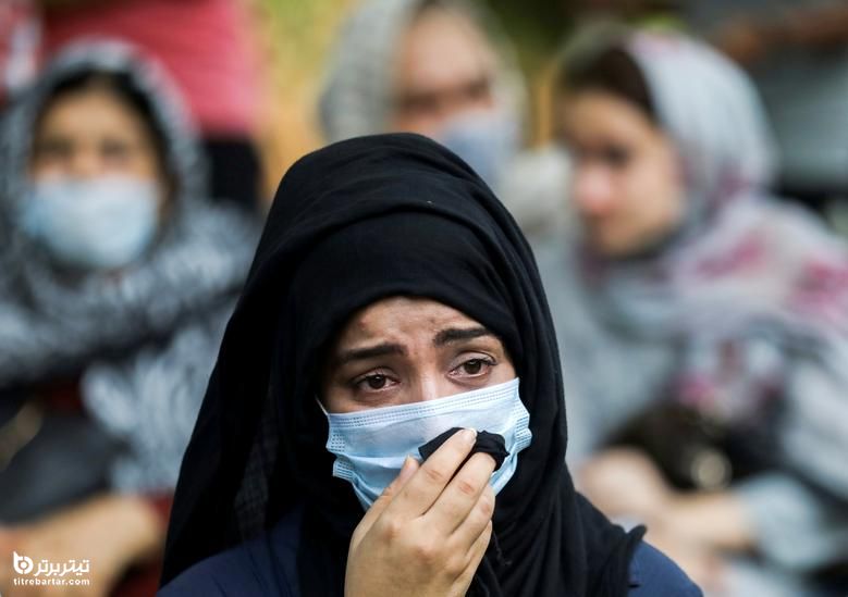یک شهروند افغان در تجمع برای درخواست از جامعه بین المللی برای کمک به مهاجران افغان در دهلی نو ، هند واکنش نشان می دهد.