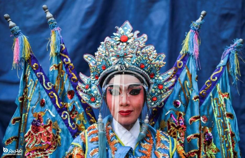 پوشش یک بازیگر سنتی اپرای چینی در محافل سال نو قمری در بانکوک 