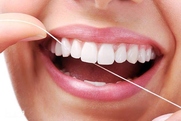 نخ دندان برای جلوگیری از کرم خوردگی دندان