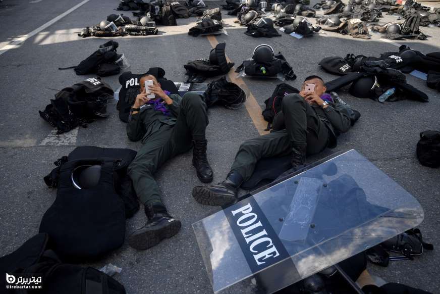 استراحت کردن پلیسهای ضد شورش در بانکوک ، تایلند 