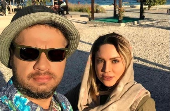 عکس لو رفته علی صادقی و همسرش در ساحل