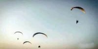 فرود چتربازان فلسطینی در غزه/ آژیر هشدار حمله موشکی به صدا درآمد