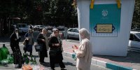 حضور متفاوت یک نوزاد در رأی‌گیری انتخابات ریاست جمهوری+عکس