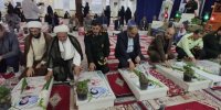 گلباران مزار شهدا همزمان با هفته دفاع مقدس در آستانه اشرفیه