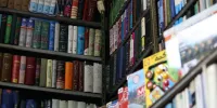 کتابفروشی امیر کبیر در چهار راه استانبول با ۲۳ میلیون تومان به صرافی تبدیل شد/ عکس