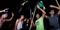 تصاویری از شادی فلسطینی‌ها پس از عملیات موفقیت آمیز القسام + فیلم