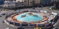 رونمایی از دیوارنگاره جدید در پایتخت | بدرقه ۱۲ میلیونی رئیس‌جمهور شهید روی دیوار میدان انقلاب | عکس