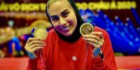 عکس | لاکی به رنگ پرچم ایران همراه با سلام نظامی خواهر هادی ساعی