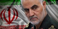 عکس | تصویر سردار سلیمانی در تجمع برزیلی‌ها در حمایت از ایران؛ ژنرال سلیمانی با پرچم جمهوری اسلامی
