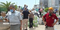 تلاش ها برای مهار حریق یک مجتمع تجاری در انزلی ادامه دارد