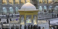 قابی تماشایی از اولین بارش برف امسال در حرم مطهر رضوی