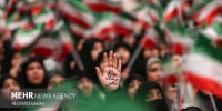 اجتماع دانشجویان قمی در محکومیت اهانت به پرچم ایران