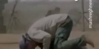 صحنه نمازخواندن یکی از فرماندهان حشدالشعبی در میدان نبرد با داعش