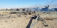 عکس  | تصویر روابط عمومی سپاه از جمجمه نظامی آمریکایی بین قطعات هواپیماهای منهدم شده در اصفهان