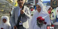 عکس | تصویر خبرگزاری دانشجو از حضور متفاوت عروس و داماد در مراسم «جان‌فدایان ایران»
