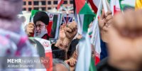 تشکیل زنجیره انسانی در مقابل نیروگاه حرارتی مشهد