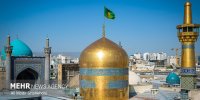 نصب کتیبه عید سعید غدیر در حرم مطهر امام رضا(ع)