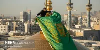 پرچم سبز رضوی بر فراز گنبد امام رضا(ع)