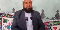 تصویری از پیکر مولوی شهید یوسف گرگیج در تجمع شبانه مردم زاهدان
