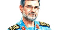 سردار شهید تنگسیری در حال خدمت به زائران حرم امام رضا