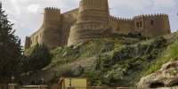 جزئیات خسارت میراث فرهنگی در لرستان در جنگ تحمیلی سوم + تصاویر قبل و بعد | آسیب به بناهای تاریخی در قلعه فلک‌الافلاک