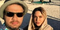 عکس لو رفته علی صادقی و همسرش در ساحل