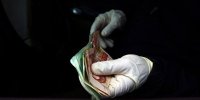 میزان ماندگاری ویروس کرونا بر روی پول