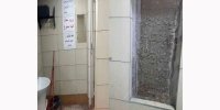 تصویر عجیب کتیبه‌ای تاریخی که دیوار یک دستشویی در همدان شد