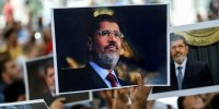 هک سایت روزنامه الأهرام با تصاویری از محمد مرسی