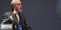 تصاویری از ظریف در کنفرانس بین‌المللی اقتصاد جهانی و تحریم‌ها