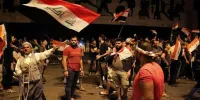 نخست‌وزیر عراق استعفا نمی‌دهد، تظاهرات فعلا متوقف می‌شود