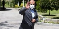 عکسی از فاتحه خوانی رئیسی بر پیکر رستم قاسمی